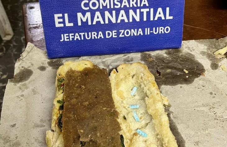 Intentó ingresar pastillas ocultas en un sándwich para un detenido